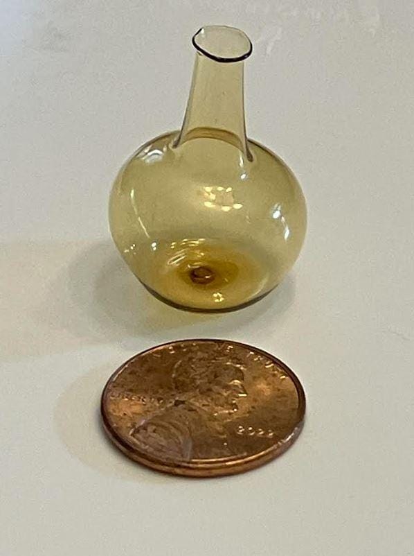 Dollhouse Miniature Amber Colored Glass Bottle