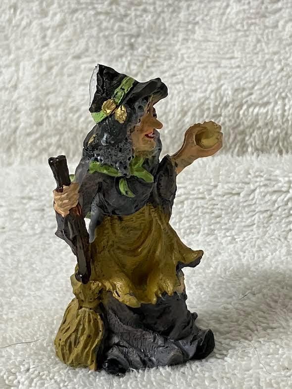 Halloween Witch Figurine in Gray with a Golden Ball