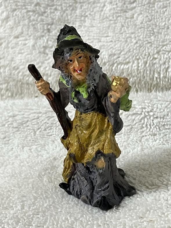 Halloween Witch Figurine in Gray with a Golden Ball