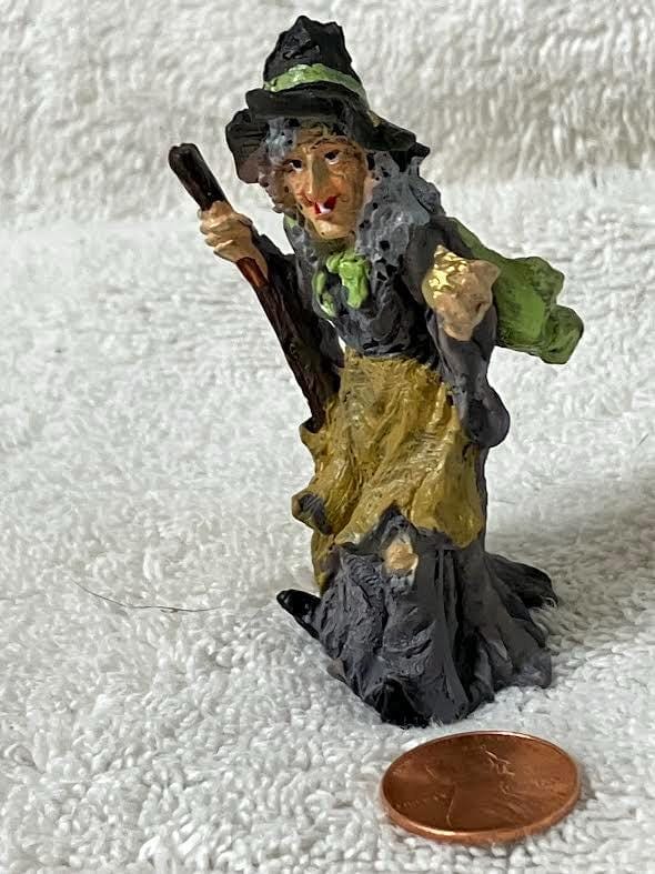 Halloween Witch Figurine in Gray with a Golden Ball