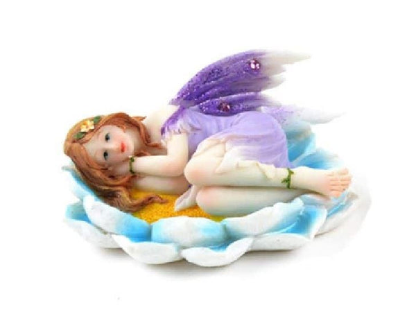 Fairy in Purple Resting on a Flower